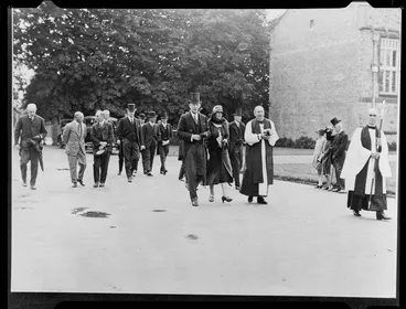 Image: Sir Charles Fergusson and Lady Alice Fergusson, with Bishop Campbell West-Watson, walking in the grounds at Christ's College, Christchurch