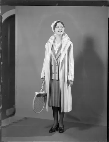 Image: Woman with tennis racket