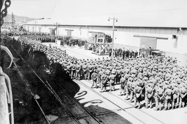 Image: [K Force troops listening to an address by the Prime Minister, Sidney Holland, before embarking on the Ormonde for Korea]
