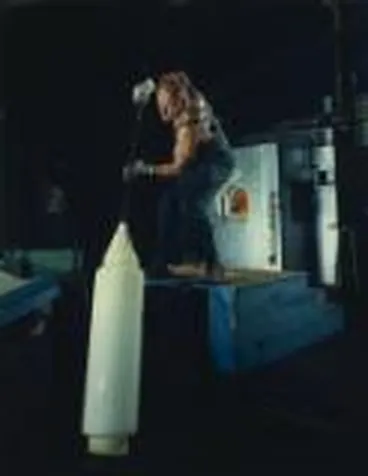 Image: Unidentified glass blower at A.C.I. Crown Glass, Christchurch, New Zealand, 1964 [transparency] /