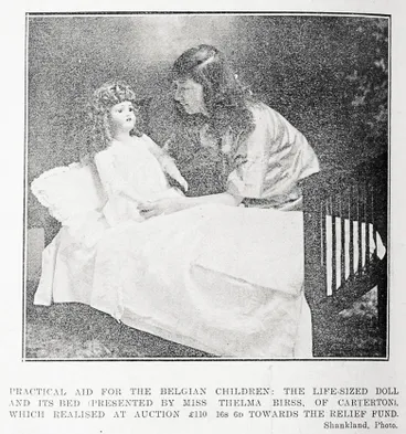 Image: Practical aid for the Belgian children: the life-sized doll and its bed presented by Miss Thelma Birss of Carterton, which realised at auction £110 16s 6d towards the relief fund