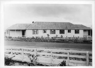 Building at C.A.C. Hamilton operation.