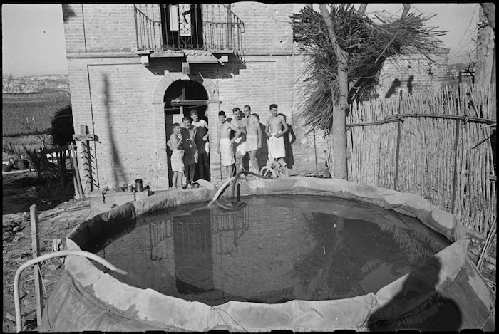New Zealanders out of the line in Italy await a hot shower, World War II - Photograph taken by George Kaye