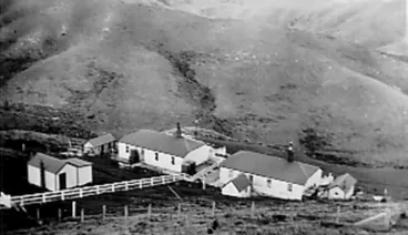 Photograph: Two houses in a valley at Pencarrow Image: Photograph: Two houses in a valley at Pencarrow