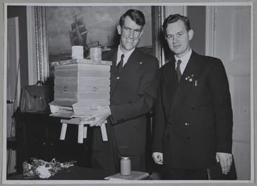 Image: [Sir Edmund Hillary with a bee box and jars of honey]