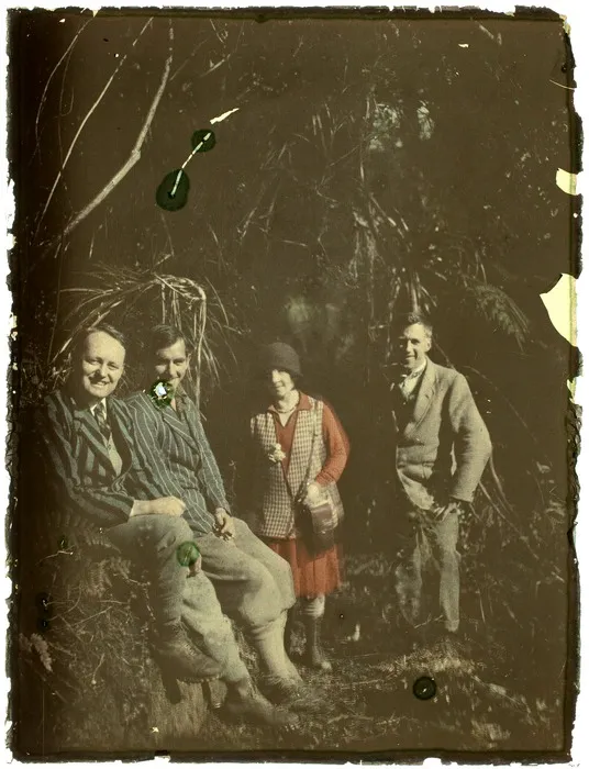 Edgar Williams (on right), with Alice Williams and two unidentified men, in native bush, probably West Coast Region