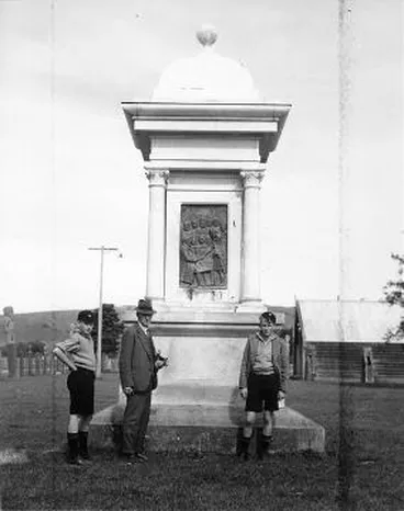 Image: Frederick Daniell and two boys at the Mahupuku Monument