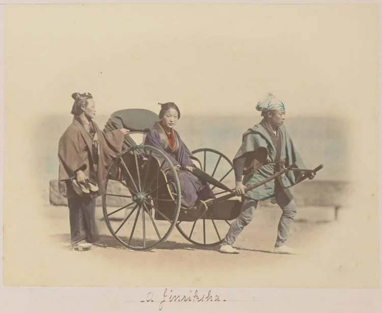Japanese woman in a rickshaw