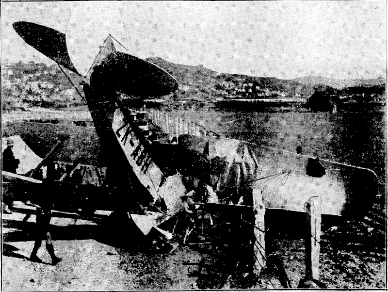 Evening I"o«t" Photo. PEffiCKSD M| RONGOTAI AERODROME^The Wellington 'Aero Club's new two-seater Moth, which crashed earVy this morning, T ■ and ims badly damaged. T%e 'plane was afterwards dismantled and conveyed to the hangar. (Evening Post, 11 November 1930)