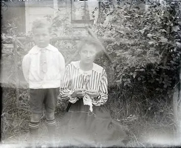 Image: Woman with a young boy : photograph