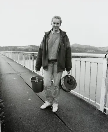 Image: Shiree Blyde, Environment Waikato technician, taking water samples at the Tainui Bridge, Huntly