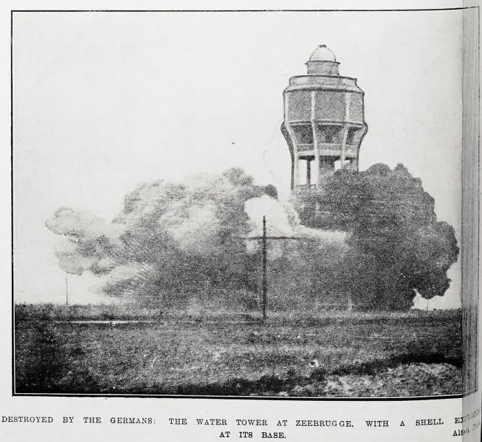 Destroyed by the Germans: the water tower at Zeebrugge, with a shell exploding at its base