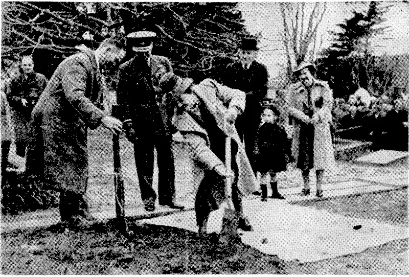 Evening Post" Photo. The Governor-General and Lady New all taking part in the Arbor Day celebrations. Above, Lady Newall planting a tree in \ Bolton Street Cemetery yesterday afternoon, while the Governor-General and the Mayor and Mayoress look on. Right, Mr. T. C. A. Hislop speaking at the ceremony near the graves of the Wake fields in Bolton Street Cemetery. Bottom centre, Mrs. Dv Pont planting a kowhai at hard Park, Wilton Road, at the morning ceremony. (Evening Post, 07 August 1941)