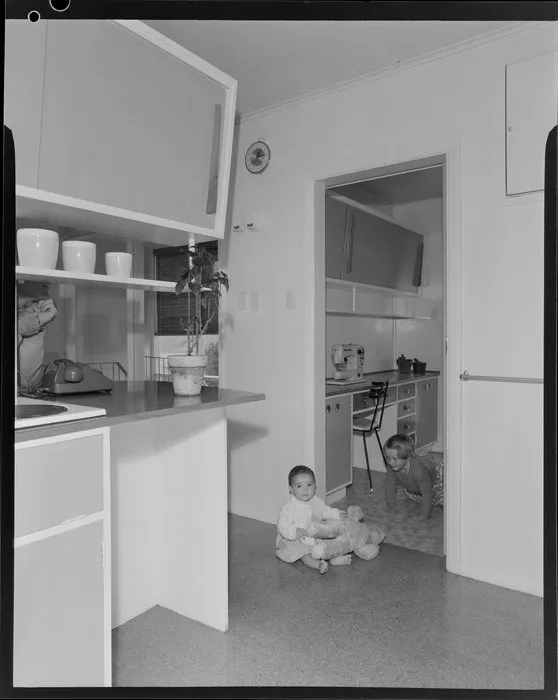 Children in the Shuker house kitchen, Titahi Bay, Wellington