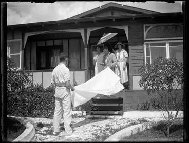 Image: Shaking the table cloth at the Barraud's beach house, Paekākāriki