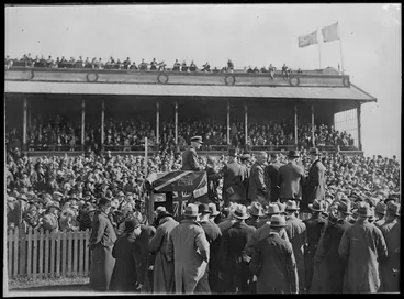 Image: Kingsford Smith, and crowd, Christchurch, after his successful flight over the Tasman Sea from Australia to New Zealand - Photograph taken by Robson and Boyer