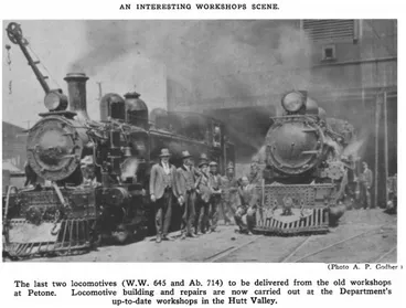 Image: An Interesting Workshops Scene. — The last two locomotives (W.W. 645 and Ab. 714) to be delivered from the old workshops at Petone. Locomotive building and repairs are now carried out at the Department's up-to-date workshops in the Hutt Valley