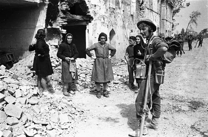 Kaye, George 1914- : NZ inf signaller and Italians of the village of Barbiano, amongst war damaged buildings