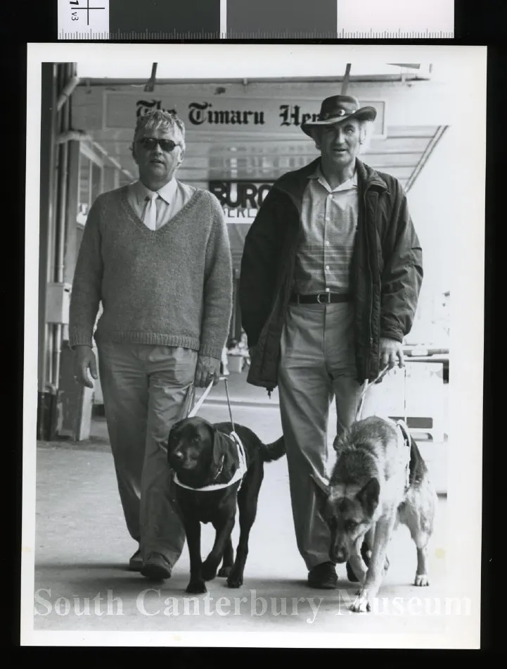 Donald Hunt and George Thomson with guide dogs
