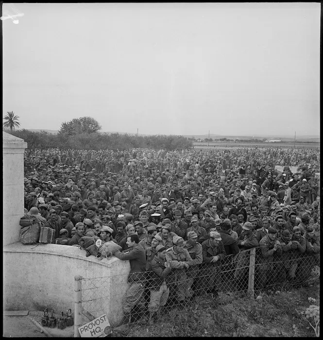 World War II prisoners in one of the POW cages, Tunisia - Photograph taken by M D Elias