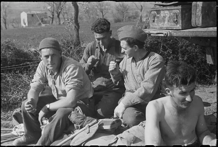 NZ frontline infantrymen rest immediately behind the line on the Cassino Front, Italy, World War II - Photograph taken by George Kaye