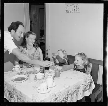 Image: Pencarrow lighthouse keeper Mr R G Jones, and family, having a meal