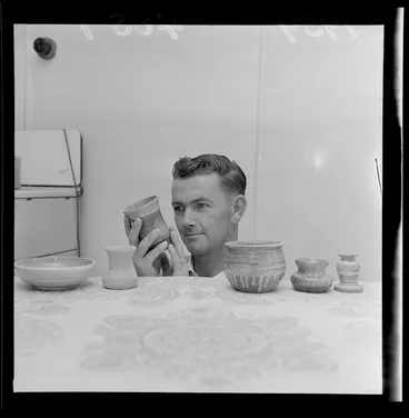 Image: Mr Henry Wilkinson, who is blind, with an assortment of pottery, Naenae, Lower Hutt