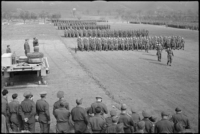 Personnel of NZ Army Service Corps march past General Freyberg in the Volturno Valley area, Italy, World War II - Photograph taken by George Kaye