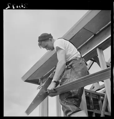 Image: Carpenter working on the construction of a state house in Naenae, Lower Hutt, Wellington