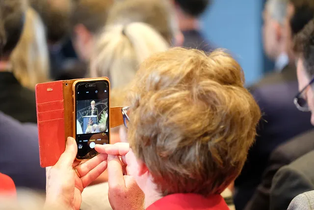 Carolyn Robertson captured on a phone during her speech, opening ceremony, TSB Space / Tautoru