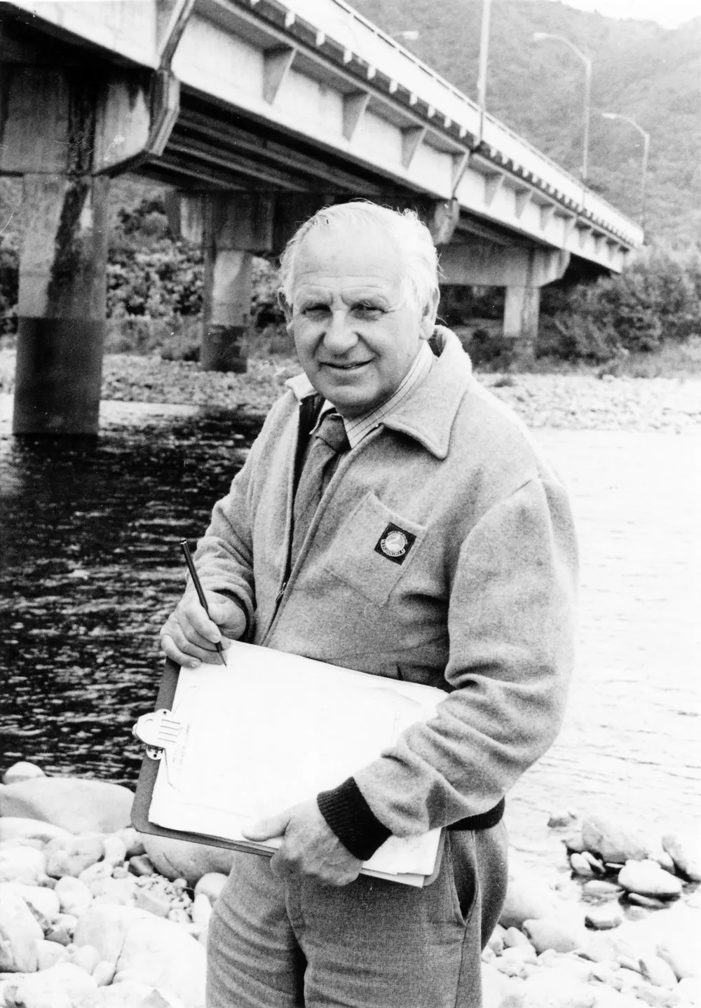 Civil defence warden Basil Frank 'Buster' Falloon, valuer, organising an emergency evacuation exercise based on Totara Park.