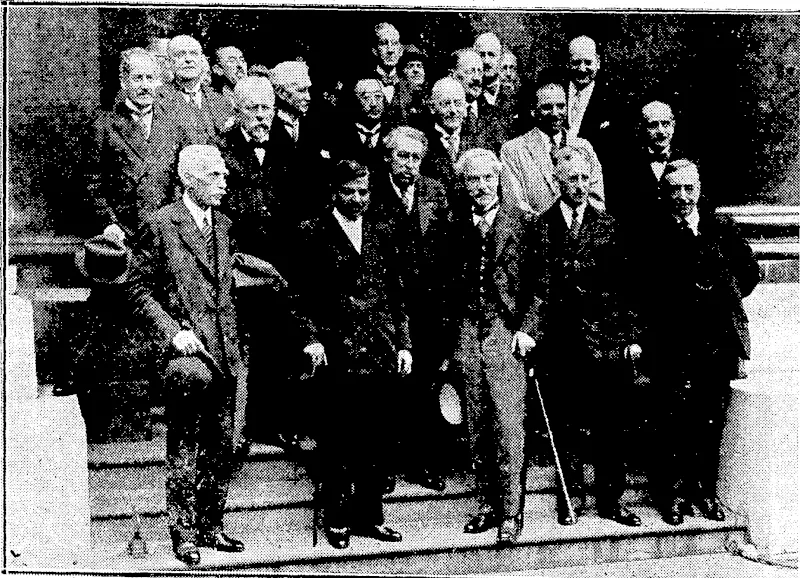 Sport and General" Photo. FACING THE EUROPEAN ECONOMIC CRISIS.-Delegates to the conference of seven nations held at the Foreign Office, London, on 21st July. Front row, from left, Mr. Andrew Mellon (U.S A ) M Laval (France), Mr. Ramsay Mac Donald, Mr. H. L. Slimsou (U.S.A.), Mr. Arthur Henderson. M. Briand (hranee) is. standing on the second step, and behind him arc grouped M. Jules Rcnkin (Belgium), M. Paul Hymans (Belgium), Mr. Matsudaria (Japan), Dr. Bruening, Dr. Curtius (Germany), Signor Grand'i (Italy), M.Bcrthelot (France). (Evening Post, 25 August 1931)
