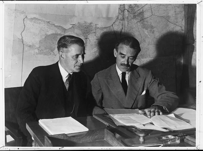 New Zealand Minister of Defence, Hon Frederick Jones, conferring with Rt Hon Richard Gavin Gardiner Casey, British Minister Resident in the Middle East