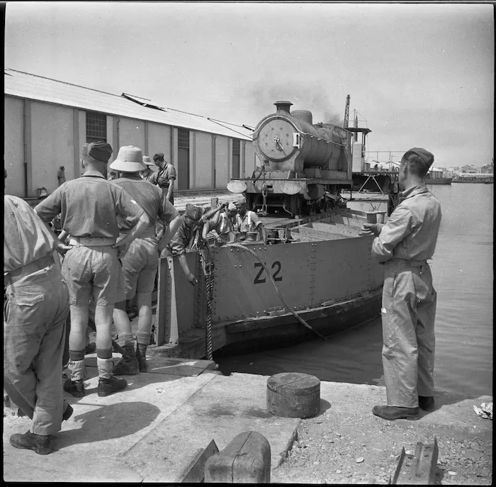 Lighter with locomotive approaching wharf at a Syrian port - Photograph taken by H Paton
