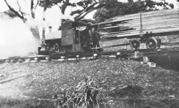 Image: Engine and truck of timber at Karekare.