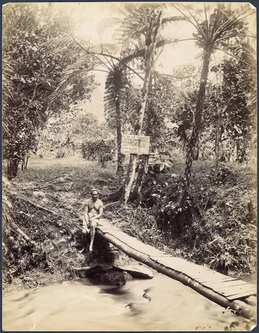 Image: Man seated on bridge, Samoa