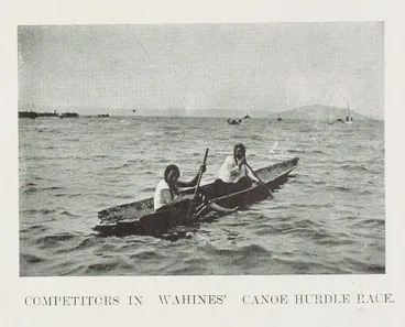 Image: Competitors in wahines' canoe hurdle race