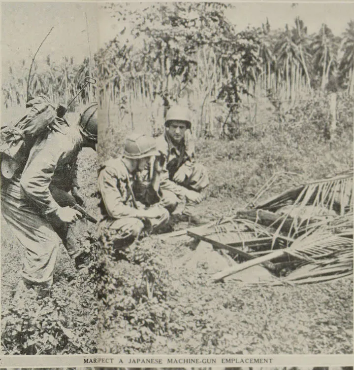 Marines inspect a Japanese machine-gun emplacement