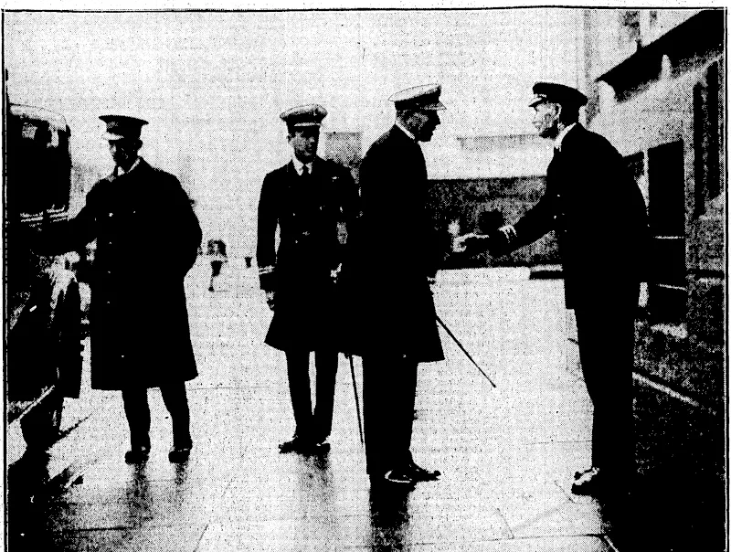 i ' , "Evening' Post" Phcto. " THE NAVY CALLS ON THE SHORE AUTHORITIES.—Rear-Admiral Geoffrey Blake, D.S.O.,made a round of visitstUsmorning. He called on the Mayor, Mr. T. C. A: Hislop, the acting-chairman of the Wellington Harbour Board, Mr. H. D. Bennett, and!the Navy' J^ague.' 'the- admiral is shown shaking hands with the Harbourmaster, Captain'Spence(omright) on arrival at the Hnfbqur- Board "Sport and General" Phot* MISS WANDAMOR&AN, a-sturdy, hard-hitting player from WesU gate-OTi'Sea, Kent, who defeated Miss Molly Gourlay 3 and.lJiri~the\ .final of: the English women's golf championship. r ' ~" (Evening Post, 02 October 1931)