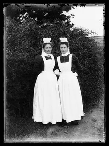 Image: [Portrait of two female attendants in the Avondale Lunatic Asylum  grounds]