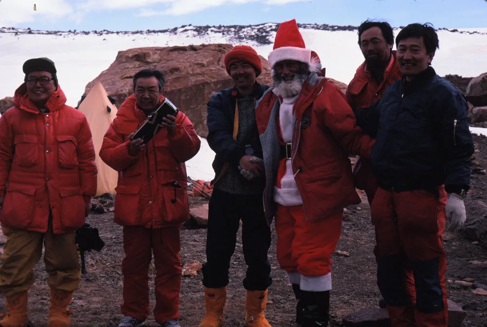 Father Christmas calls in on the Japanese group at The Labyrinth