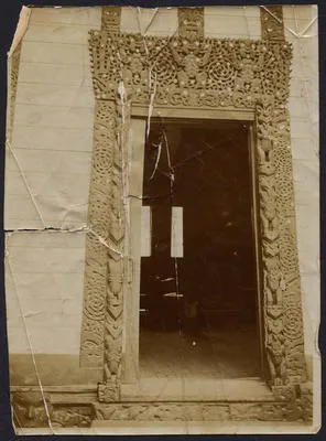 [Marae doorway with extensive carving]