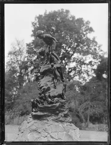 Image: Oamaru Gardens, Otago, view of Wonderland statue of two boys by the sculptor Thomas Clapperton, closeup with fairies around base