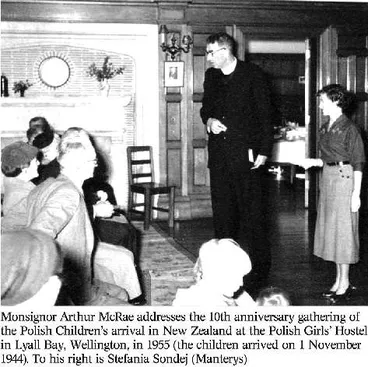 Image: Monsignor Arthur McRae addresses the 10th anniversary gathering of the Polish Children's arrival in New Zealand at the Polish Girls' Hostel in Lyall Bay, Wellington, in 1955 (the children arrived on 1 November 1944). To his right is Stefania Sondej (Ma...