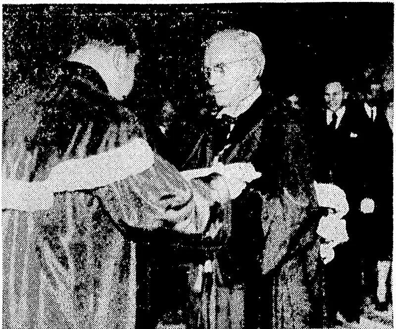 Sir Alexander Fleming, who discovered penicillin* receiving an honorary degree at the University of Brussels, the decoration being made by the Rector, Dr. /. F. Cox. (Evening Post, 18 December 1945)
