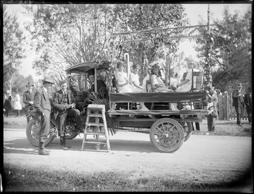 Image: Girls in costume on the back of a decorated truck, for an unidentified parade, Hawkes Bay