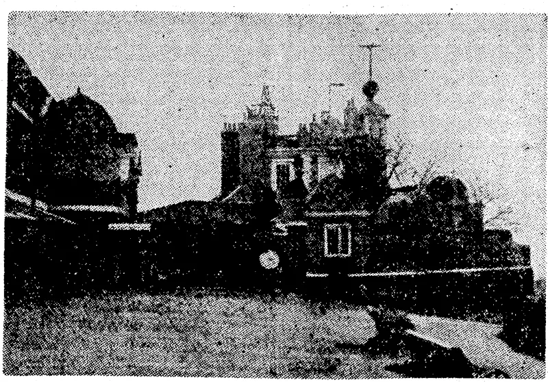 The Royal Observatory at Greenwich Park which has been bombed. The meridian line is along the" path to the right. Instruments which set the time for the world were damaged. (Evening Post, 07 December 1940)