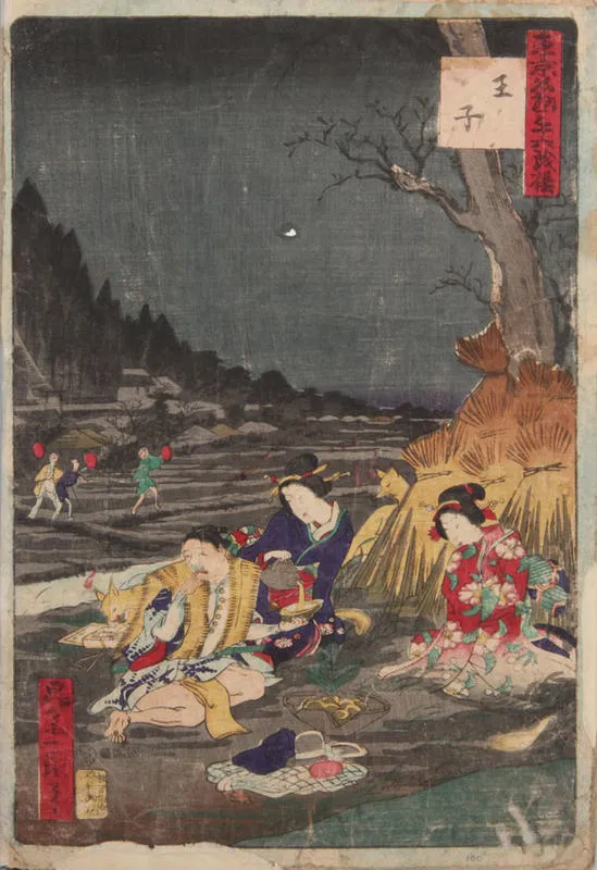 A man & two women picnic while a fox helps itself to the contents of a box