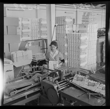 Image: Unidentified woman processing empty egg cartons, at a Lower Hutt factory, Wellington