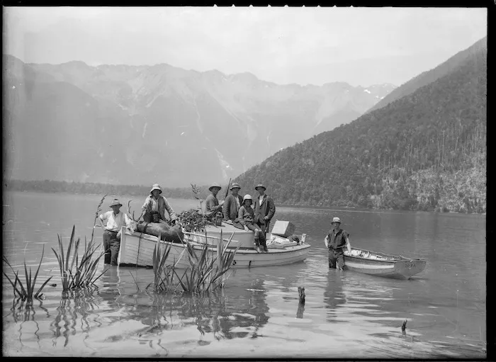 Deer hunters in a dinghy
